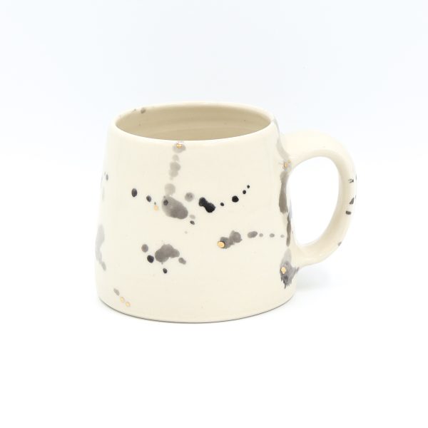 black and gold speckled mug