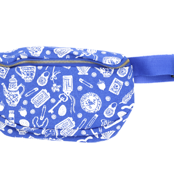 Bright blue hip bag with a gold zipper and matching blue strap with a black plastic buckle. Photographed on a white background.