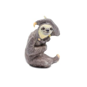 Image of a small sloth shaped plastic figurine posed sitting with an arm over its head.