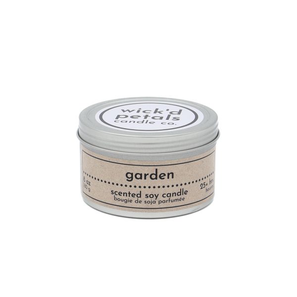 A photo of an 8 oz tin can containing a soy wax candle in the scent of Garden.