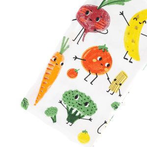 image of a tea towel from above and mostly on the right hand side of the image square. It features living food with eyeballs and mouths.