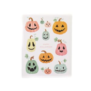 white card with white envelope with a pattern of unique looking jack o lanterns or carved pumpkins in different colours.