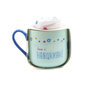 Light blue with a dark blue handle, this mug features the phrase "Have a bright Hanukkah!"