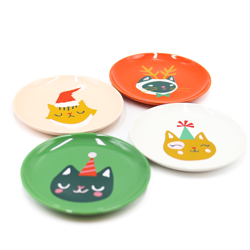 let it meow danica app plates 2 four plates organized in a diamond, green, white, peach, orange, each with a kitty on it.