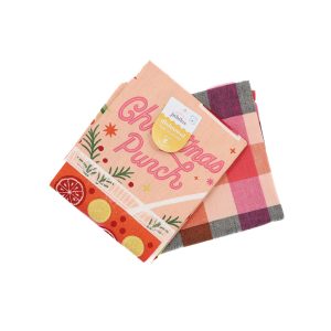 peach coloured tea towels with warm patterns and alcohol bottles.