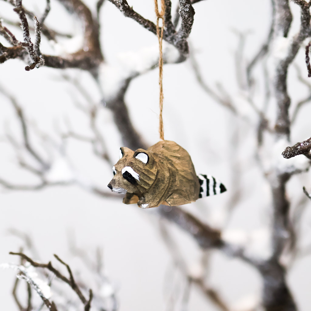 wood racoon ornament wood carved racoon loafing